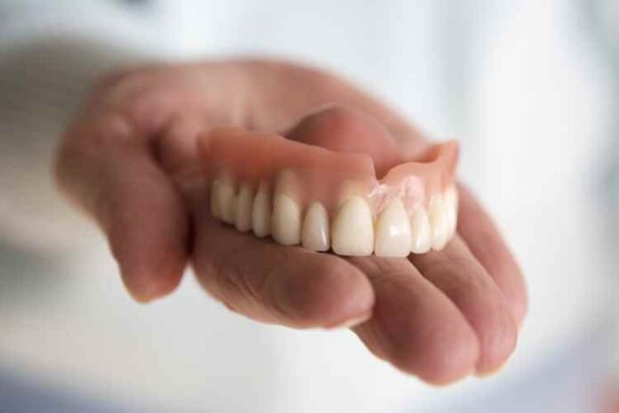 Should I Get Dentures or Dental Implants